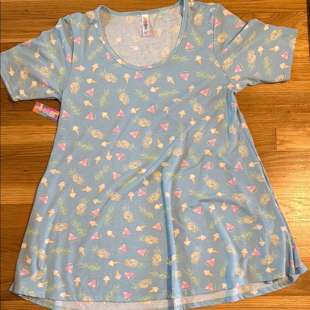 LuLaRoe Light Blue Top with Pineapple and Ice Cream Print